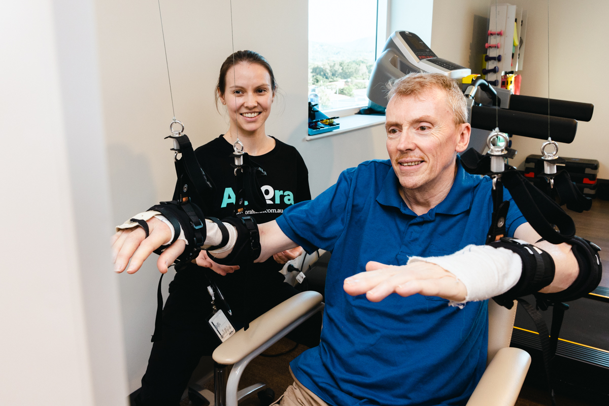 What is robotic-assisted rehabilitation and how does it work?